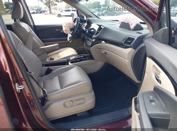 5FNYF5H69MB008726 2021 HONDA PILOT Maroon Vista interior delantera
