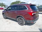 2021 Honda Pilot 2wd Touring 7 Passenger Maroon vin: 5FNYF5H69MB008726