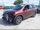 2021 Honda Pilot 2wd Touring 7 Passenger Maroon vin: 5FNYF5H69MB008726
