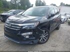 2018 Honda Pilot Touring Черный vin: 5FNYF5H95JB027019