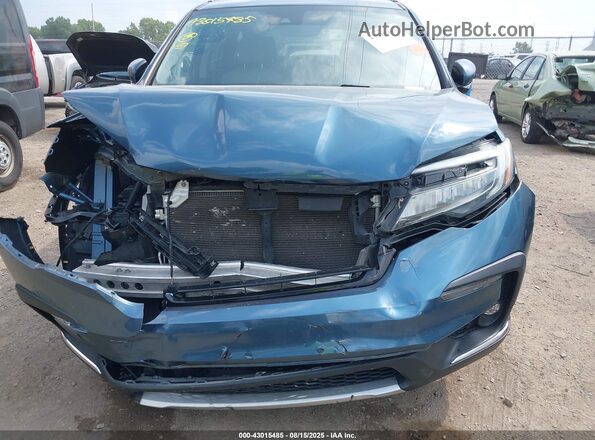 5FNYF6H95MB000378 2021 HONDA PILOT Blue Rear interior view