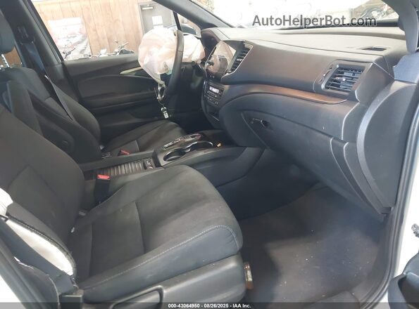 5FNYF8H26MB021271 2021 HONDA PASSPORT White Vista interior delantera