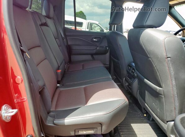 5FPYK3F87RB014589 2024 HONDA RIDGELINE Red Vista de los asientos traseros