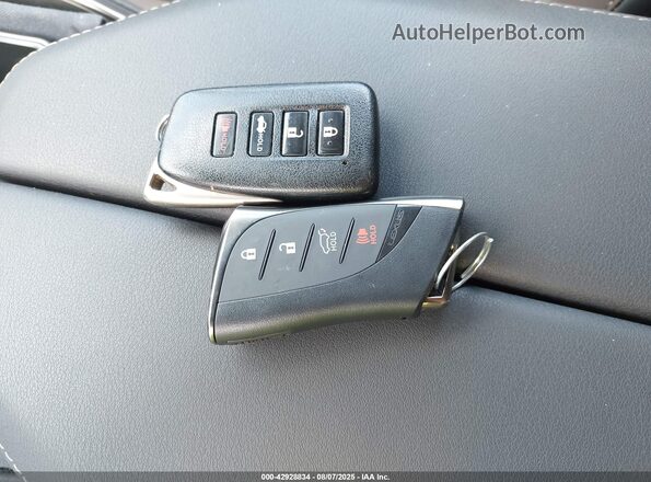 5TDAAAB64SS028411 2025 LEXUS TX White Widok deski rozdzielczej