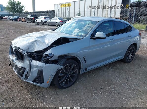 5UX33DT09N9N17256 2022 BMW X4 Gray Front left