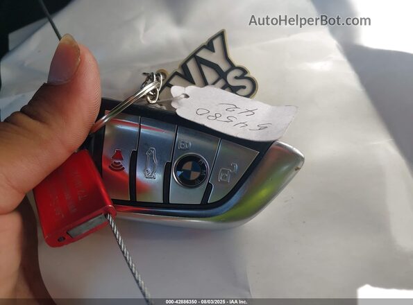 5UXCY8C03L9C75797 2020 BMW X6 Синий Вид панели приборов