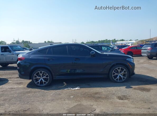 5UXCY8C03L9C75797 2020 BMW X6 Синий Вид задней части салона