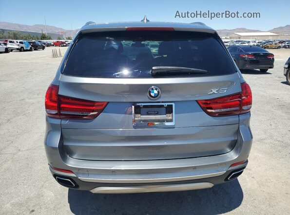 5UXKR2C58J0X09082 2018 BMW X5 Серебряный Вид сзади
