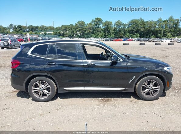 5UXTY5C00M9F41888 2021 BMW X3 Black Widok wnętrza z tyłu
