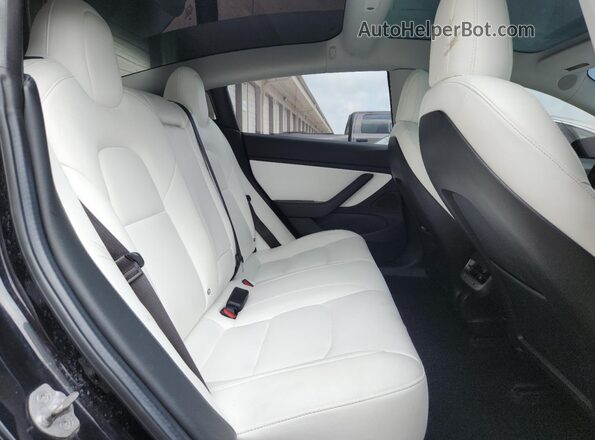 5YJ3E1EB2JF099289 2018 TESLA MODEL Black Vista de los asientos traseros