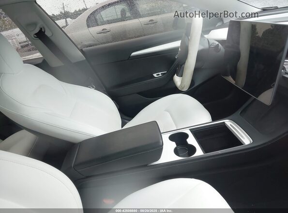 5YJ3E1EB5MF981321 2021 TESLA MODEL 3 Blue Widok wnętrza z przodu