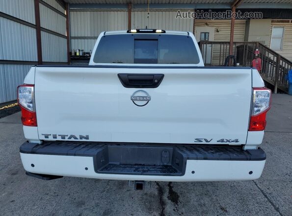 1N6AA1EC6RN103852 2024 NISSAN TITAN Белый Вид салона спереди