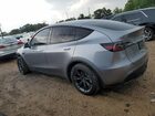 2025 Tesla Model Y Silver vin: 7SAYGAEEXSF303786