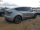 2025 Tesla Model Y Silver vin: 7SAYGAEEXSF303786