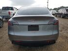 2025 Tesla Model Y Silver vin: 7SAYGAEEXSF303786