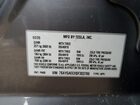 2025 Tesla Model Y Silver vin: 7SAYGAEEXSF303786