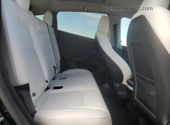 7SAYGDED0SF320461 2025 TESLA MODEL Black Widok tylnych siedzeń
