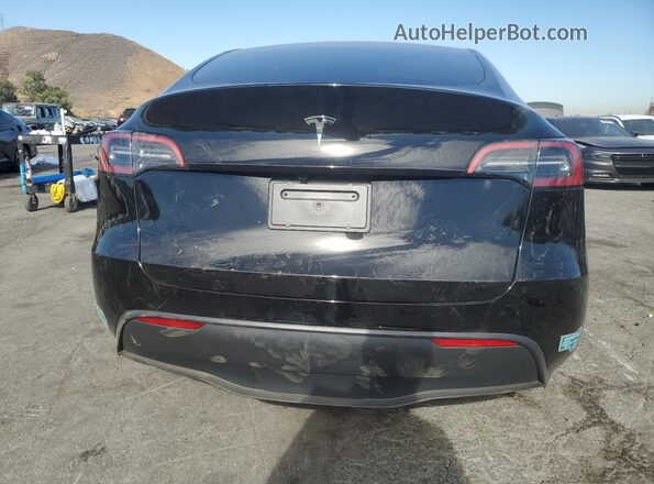 7SAYGDED0SF320461 2025 TESLA MODEL Black Widok z tyłu
