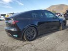 2025 Tesla Model Y Black vin: 7SAYGDED0SF320461