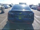 2025 Tesla Model Y Rwd Black vin: 7SAYGDED3SF231189