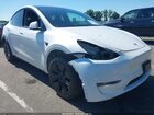 2025 Tesla Model Y Long Range Dual Motor All-wheel Drive White vin: 7SAYGDEE4SA337706