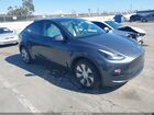 2023 Tesla Model Y Awd/long Range Dual Motor All-wheel Drive Gray vin: 7SAYGDEE5PF877835
