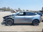 2024 Tesla Model Y Long Range Dual Motor All-wheel Drive Gray vin: 7SAYGDEE6RA300764