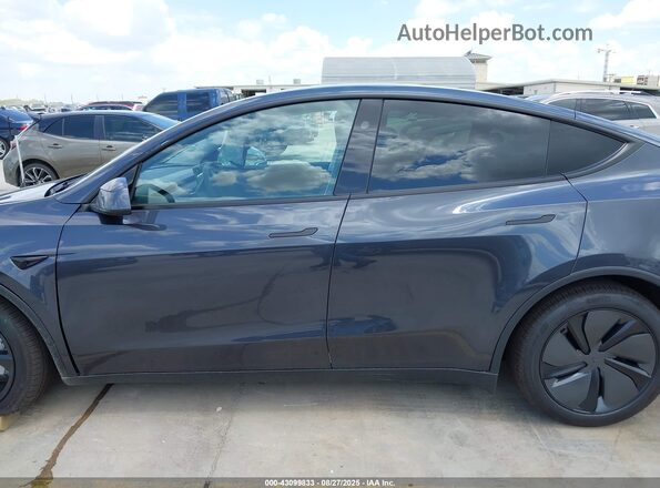 7SAYGDEE9TA399944 2026 TESLA MODEL Y Серый Вид задней части салона