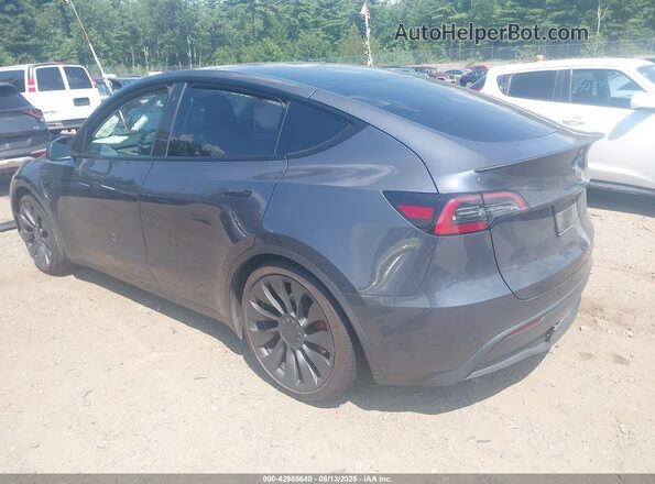7SAYGDEF9PF614739 2023 TESLA MODEL Y Gray Tył lewy