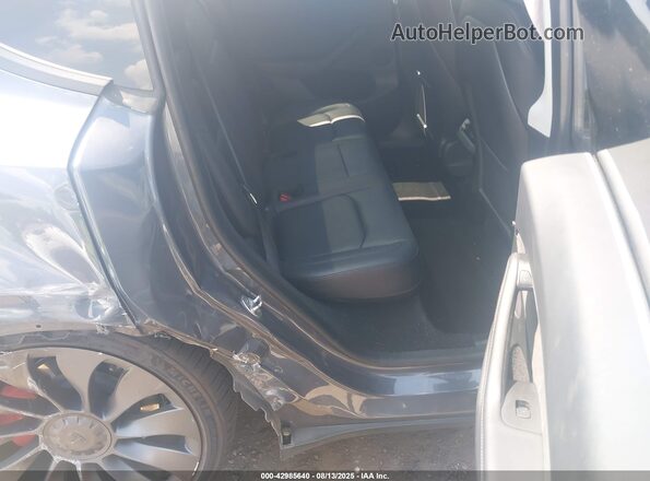 7SAYGDEF9PF614739 2023 TESLA MODEL Y Gray Widok tylnych siedzeń