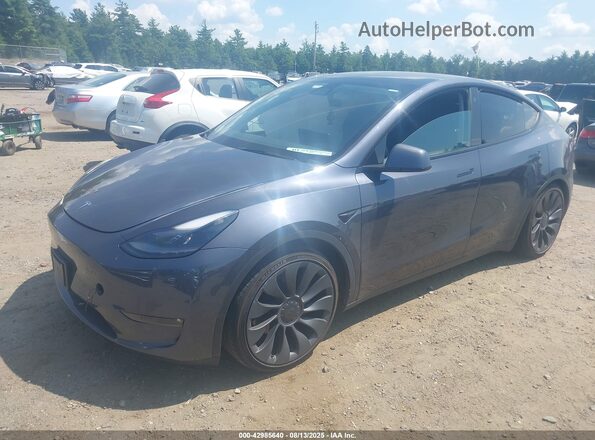 7SAYGDEF9PF614739 2023 TESLA MODEL Y Gray Przód lewy