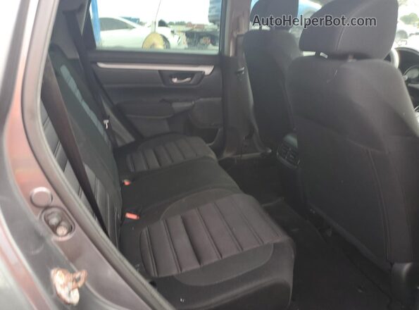 2HKRW5H34JH424335 2018 HONDA CRV Gray Rear interior view