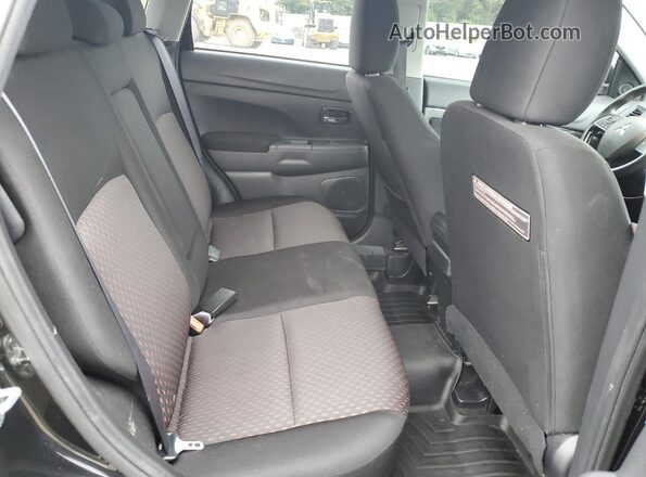 JA4AP3AU6JU007638 2018 MITSUBISHI OUTLANDER Black Widok wnętrza z tyłu