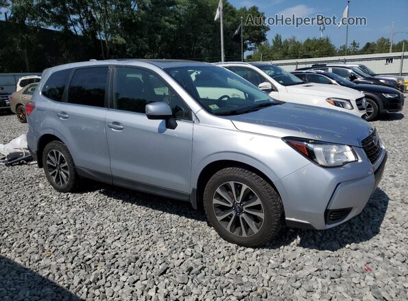 JF2SJGECXJH411587 2018 SUBARU FORESTER2. Gray Front right