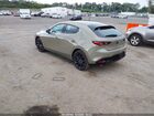 2024 Mazda Mazda3 Hatchback 2.5 Carbon Turbo Tan vin: JM1BPBYY6R1704673