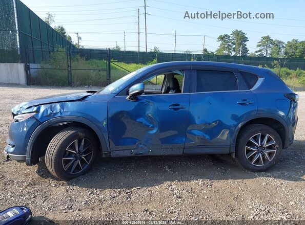 JM3KFBCM6J0435566 2018 MAZDA CX-5 Blue Widok wnętrza z tyłu