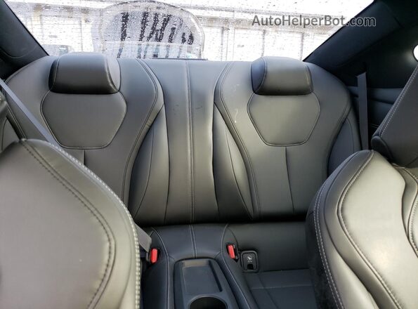 JN1EV7EK2JM340838 2018 INFINITI Q60 Gray Vista de los asientos traseros