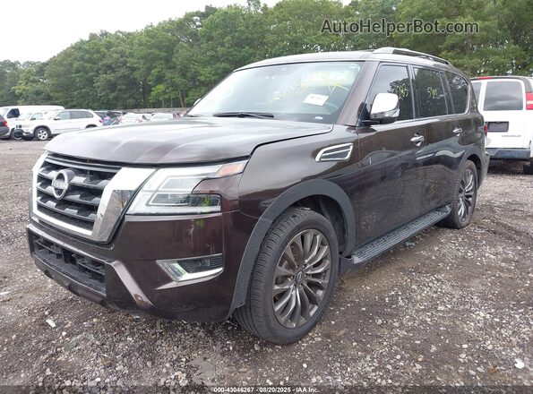 JN8AY2DBXM9792751 2021 NISSAN ARMADA Maroon Vista tres cuartos delantera izquierda