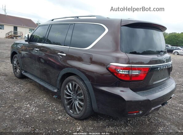 JN8AY2DBXM9792751 2021 NISSAN ARMADA Maroon Vista interior trasera