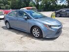 2021 Toyota Corolla Le Blue vin: JTDEPMAE7MJ183304