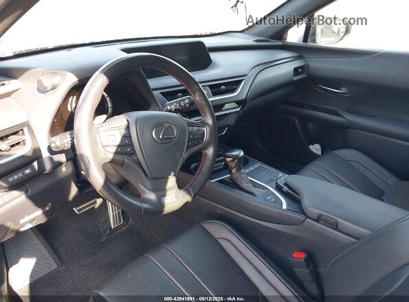 JTHU9JBH3K2019678 2019 LEXUS UX 250H Черный Вид салона спереди