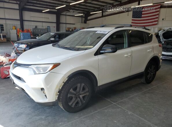 JTMBFREV6JJ180953 2018 TOYOTA LE White Vista tres cuartos delantera izquierda