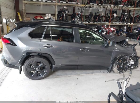 JTME6RFV7MD516219 2021 TOYOTA RAV4 HYBRID Gray Vista interior trasera