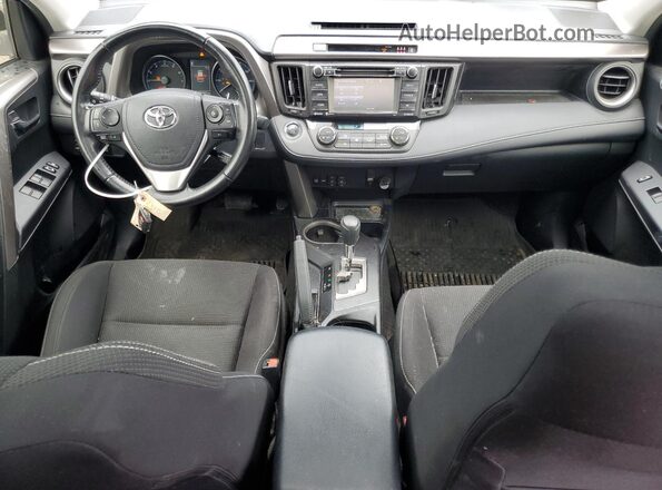 JTMRFREVXJD255960 2018 TOYOTA RAV4 Синий Вид панели приборов