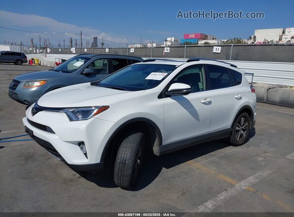 JTMWFREV0JJ165494 2018 TOYOTA LE Белый Передняя левая четверть