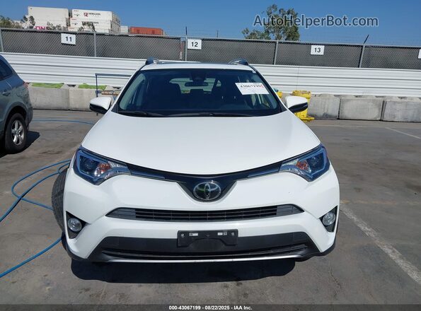 JTMWFREV0JJ165494 2018 TOYOTA LE Белый Вид щитка приборов
