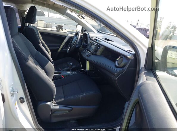 JTMWFREV0JJ165494 2018 TOYOTA LE Белый Вид салона спереди