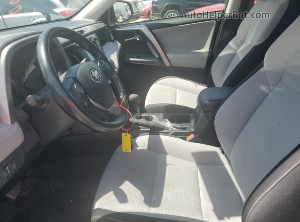 JTMWFREV0JJ201698 2018 TOYOTA RAV4 Gray Vista interior delantera