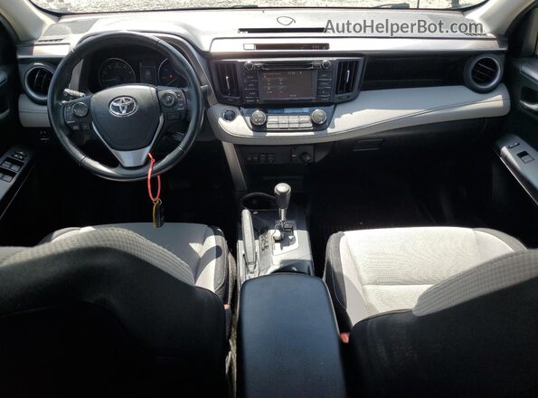 JTMWFREV0JJ201698 2018 TOYOTA RAV4 Gray Vista del salpicadero