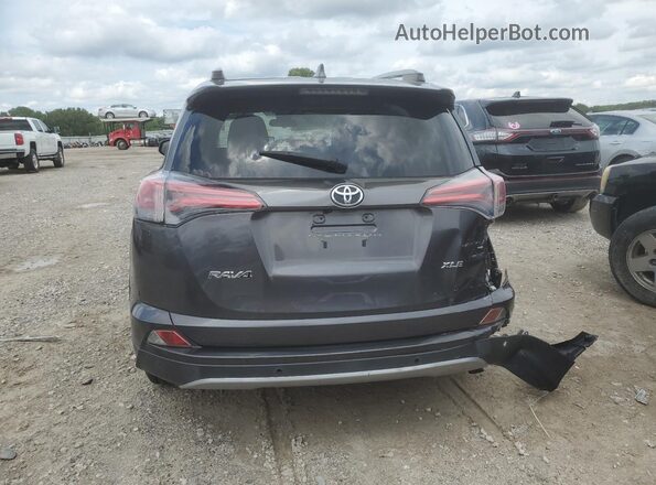 JTMWFREV5JJ171730 2018 TOYOTA RAV4 Gray Widok z tyłu